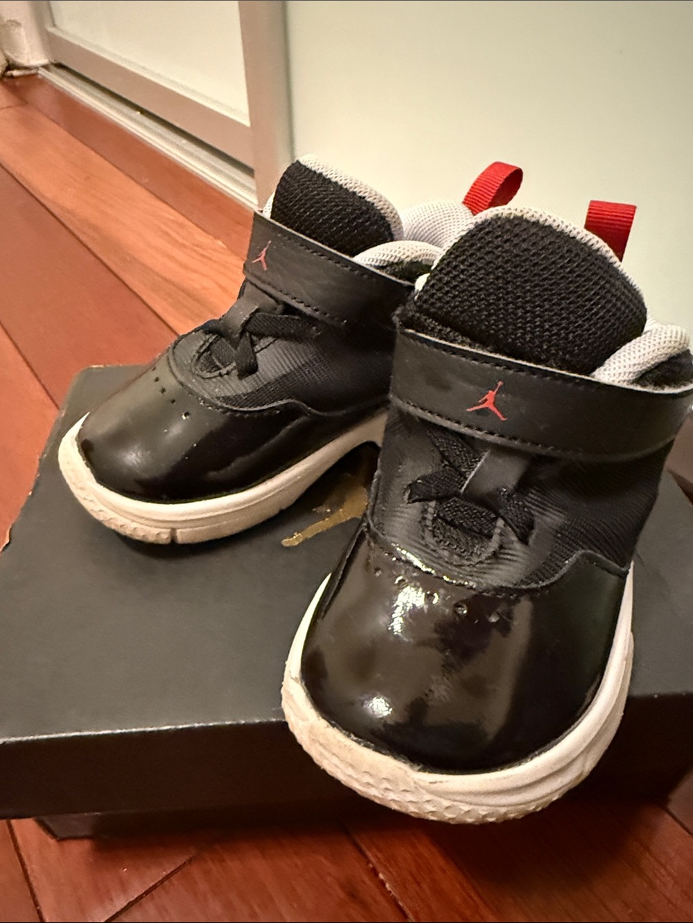 Kids Black and Red Jordan Sneakers